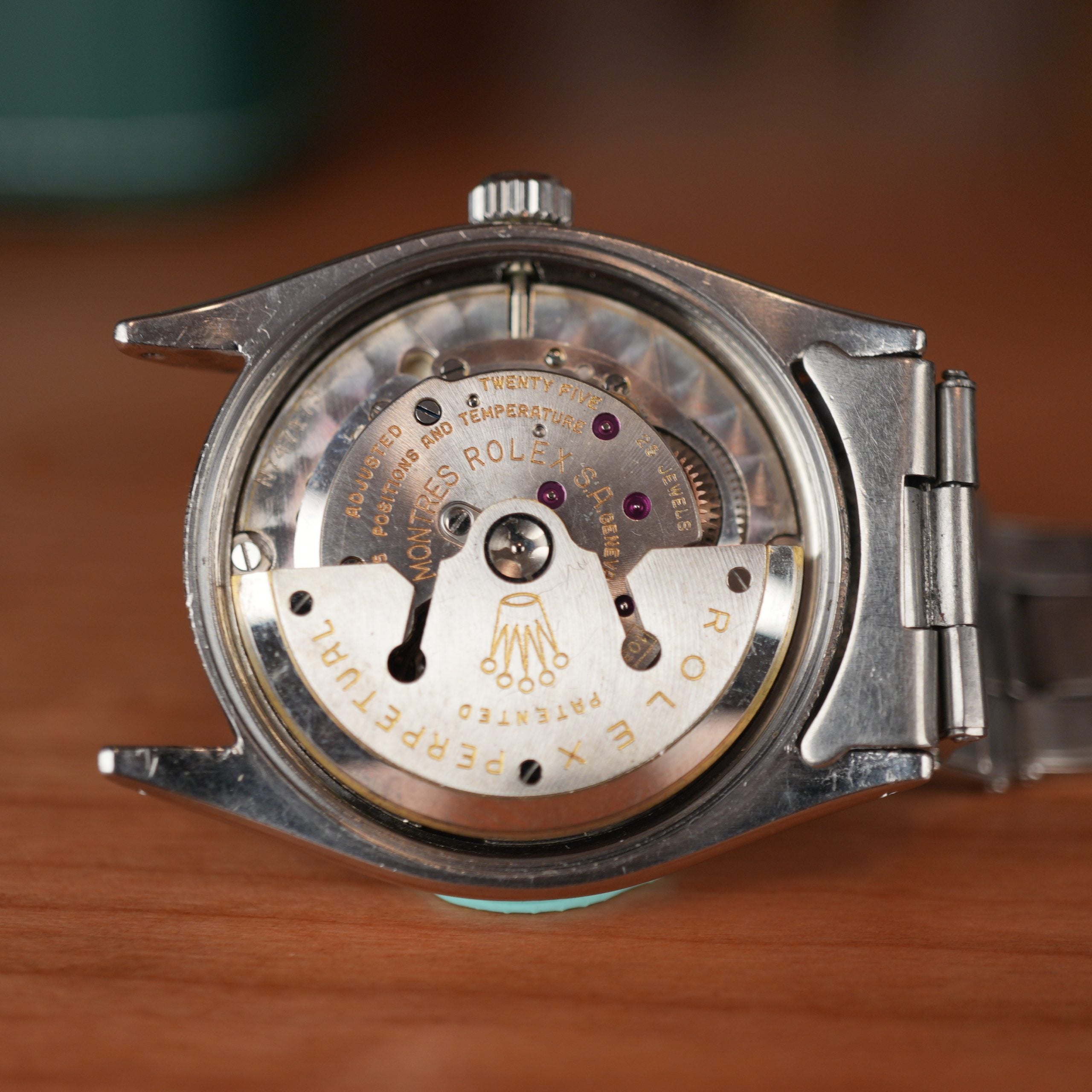 1957 Rolex Oyster Perpetual 6569 Rare Rhodium Dial Turned Bezel Original Bracelet