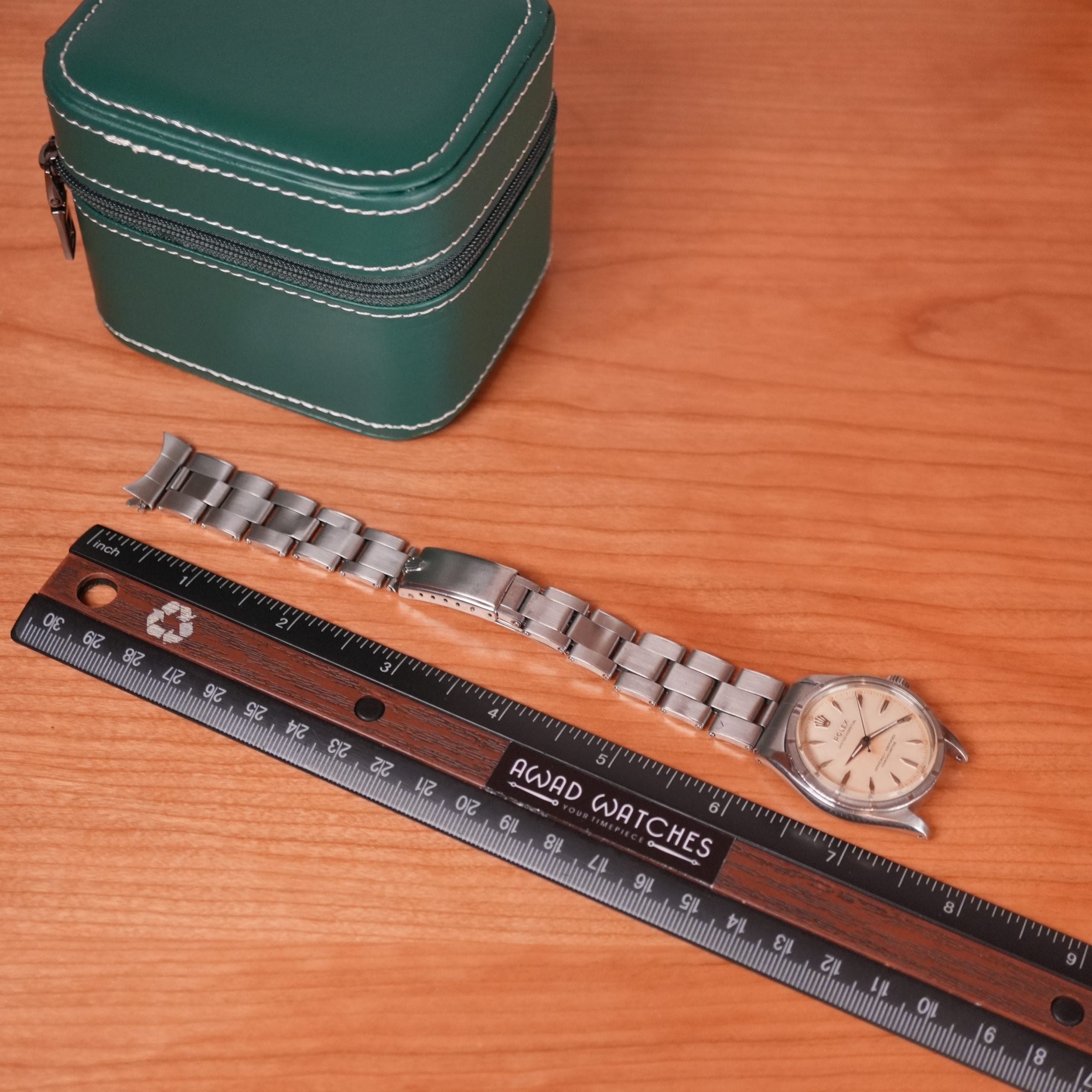 1957 Rolex Oyster Perpetual 6569 Rare Rhodium Dial Turned Bezel Original Bracelet