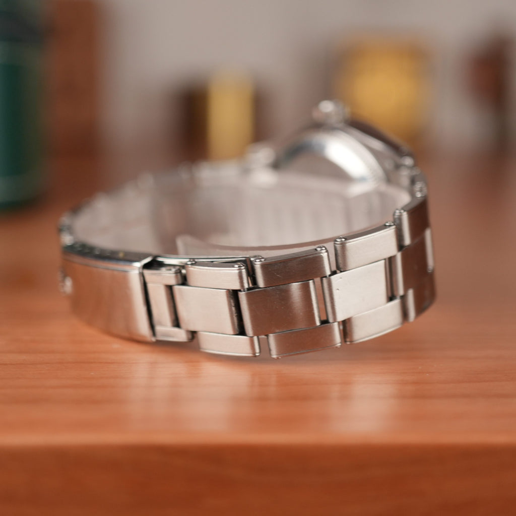 1957 Rolex Oyster Perpetual 6569 Rare Rhodium Dial Turned Bezel Original Bracelet