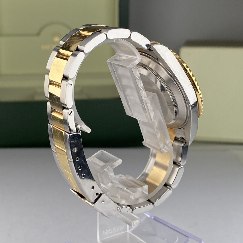 2004 Rolex Submariner 16613 Blue Unpolished Steel & Gold Factory Sultan Serti Diamond Dial