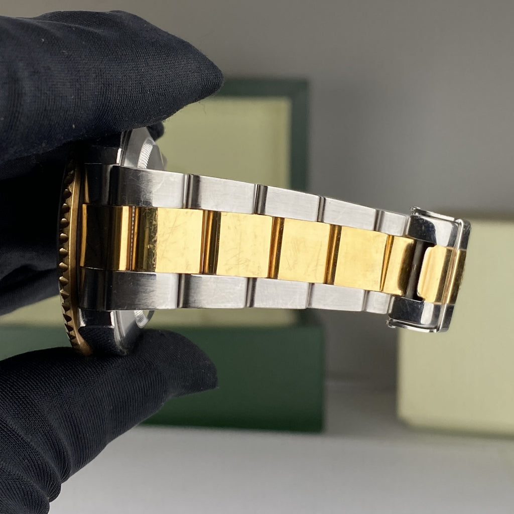 2004 Rolex Submariner 16613 Blue Unpolished Steel & Gold Factory Sultan Serti Diamond Dial