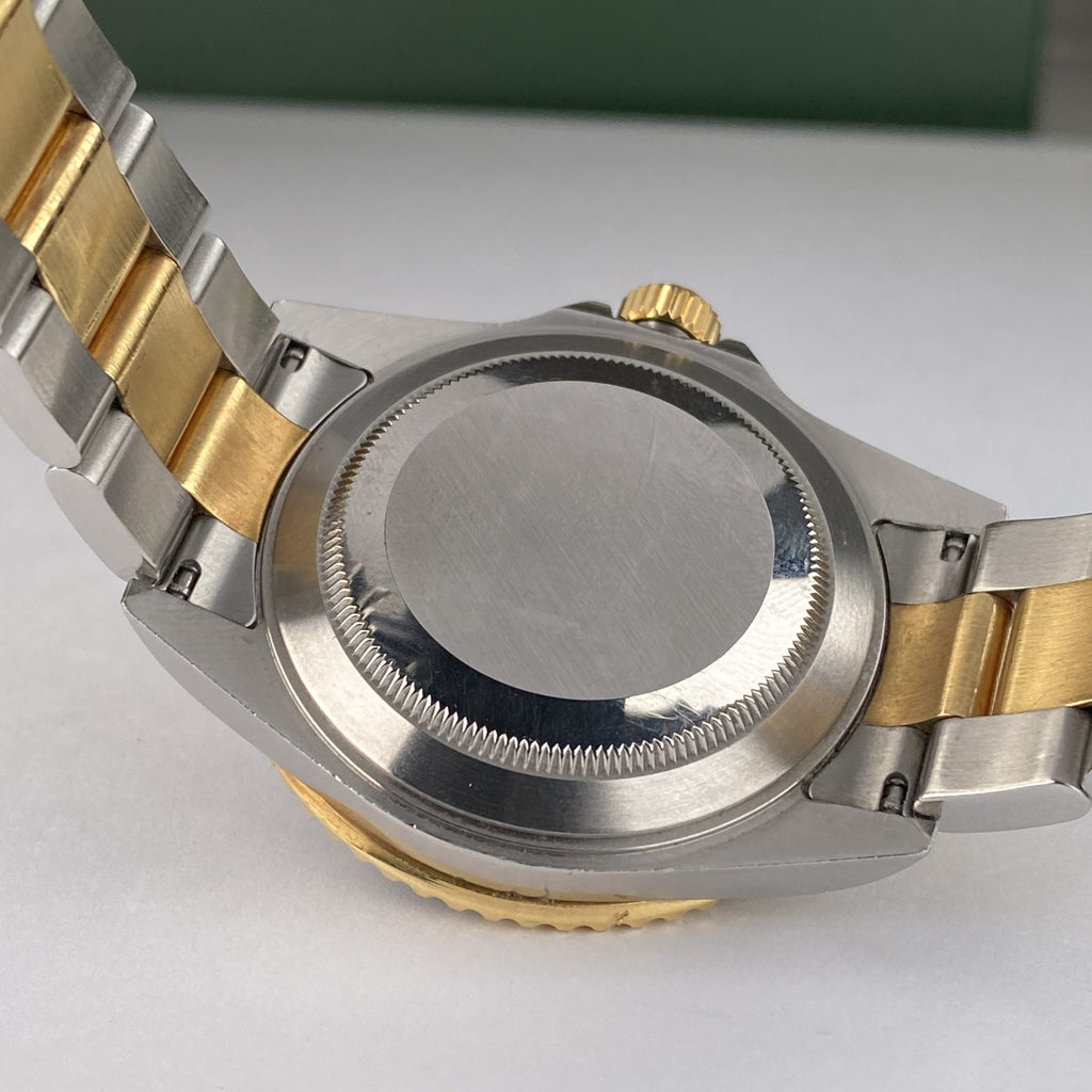 2004 Rolex Submariner 16613 Blue Unpolished Steel & Gold Factory Sultan Serti Diamond Dial