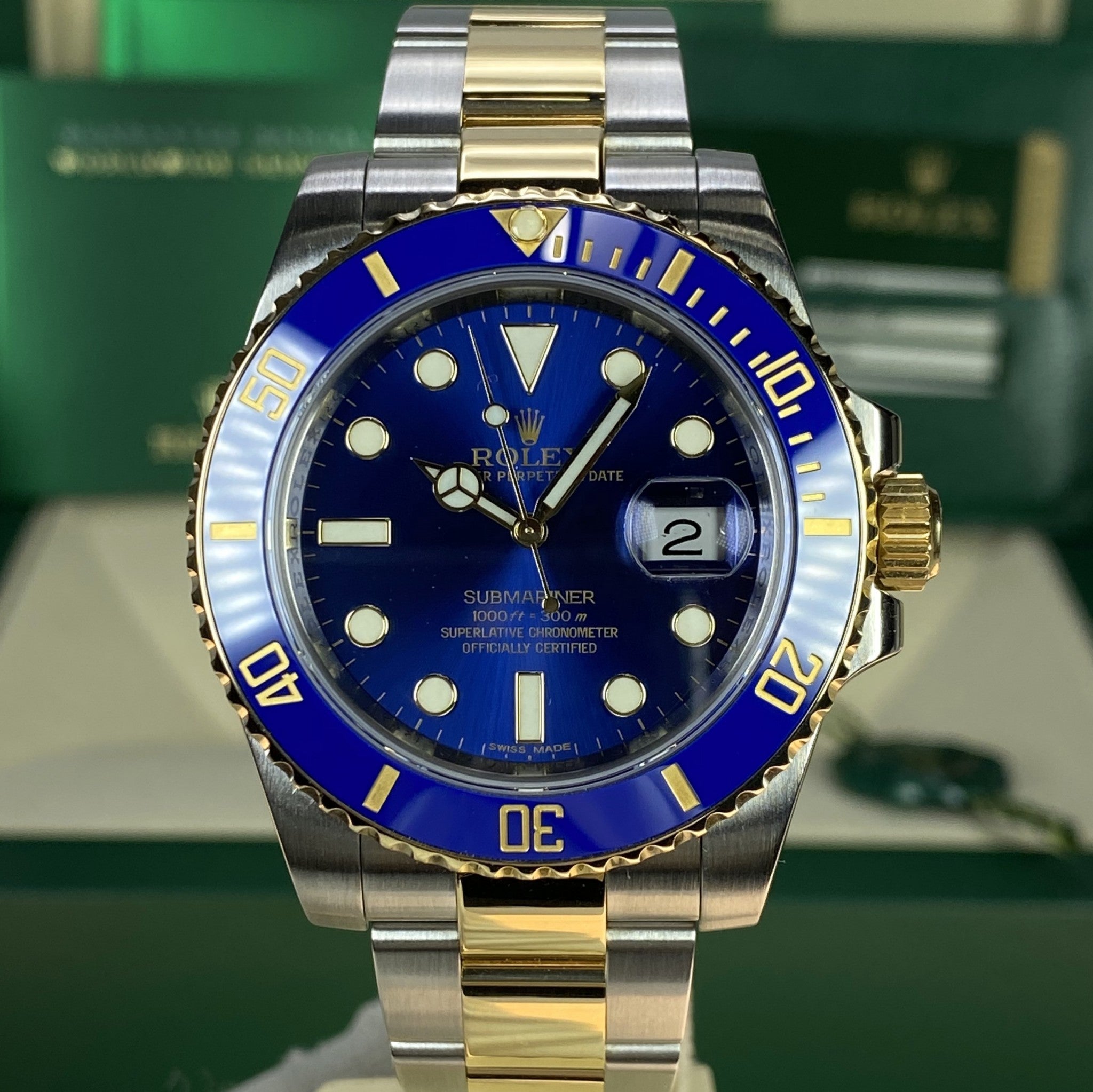 2014 Rolex Submariner 116613LP 18k gold & Steel Blue Dial Box and Card Full Set