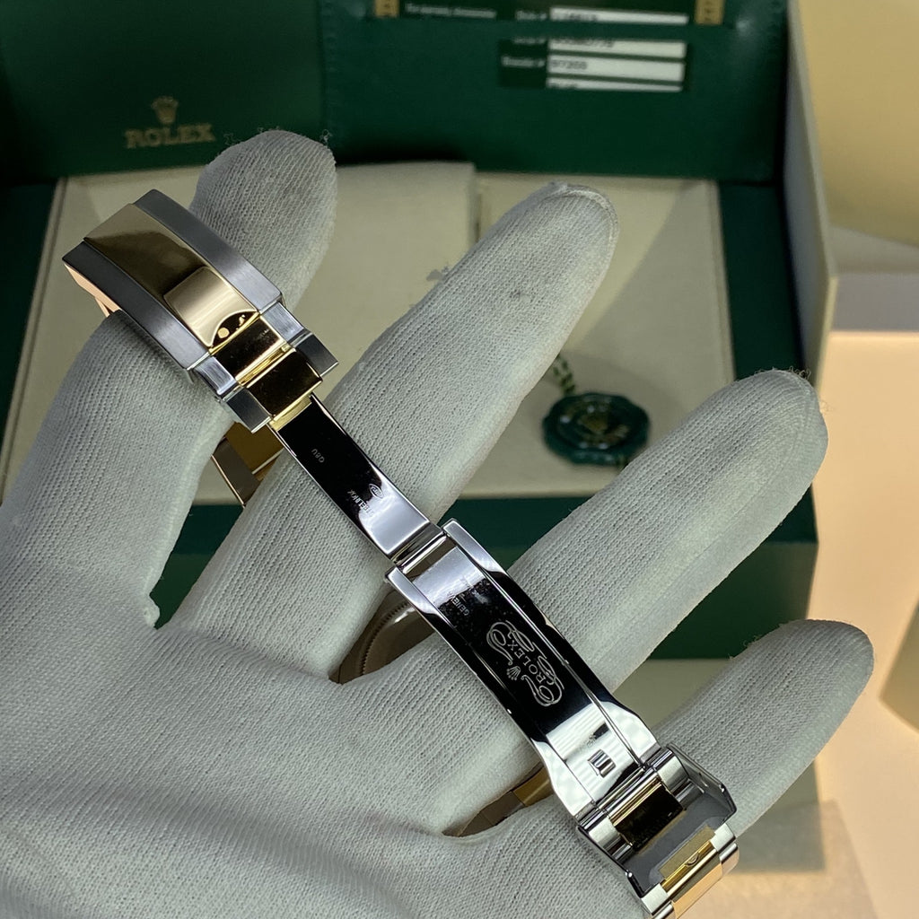 2014 Rolex Submariner 116613LP 18k gold & Steel Blue Dial Box and Card Full Set