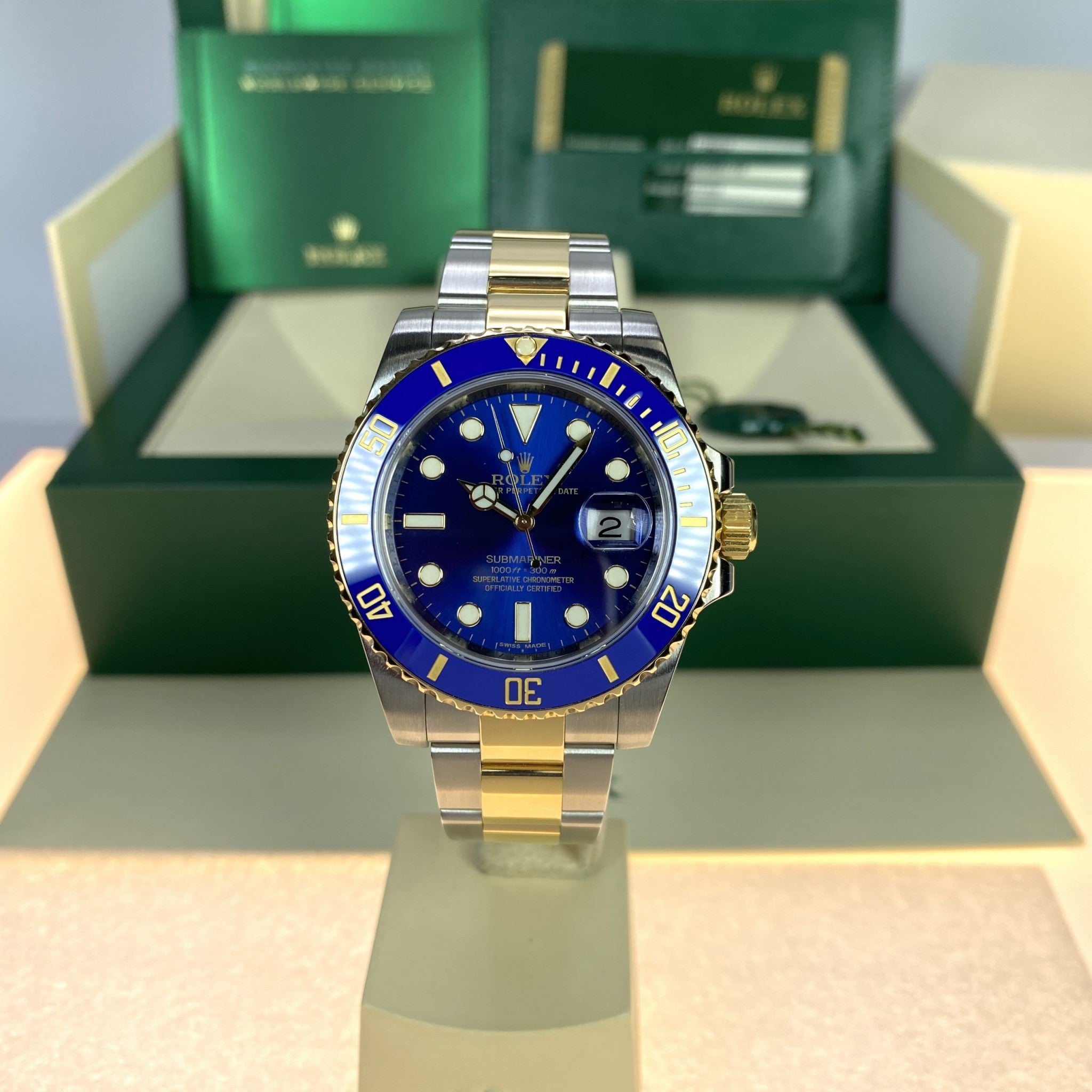 2014 Rolex Submariner 116613LP 18k gold & Steel Blue Dial Box and Card Full Set