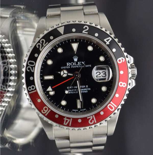 Rolex GMT Master II Coke - F Serial no Holes Case