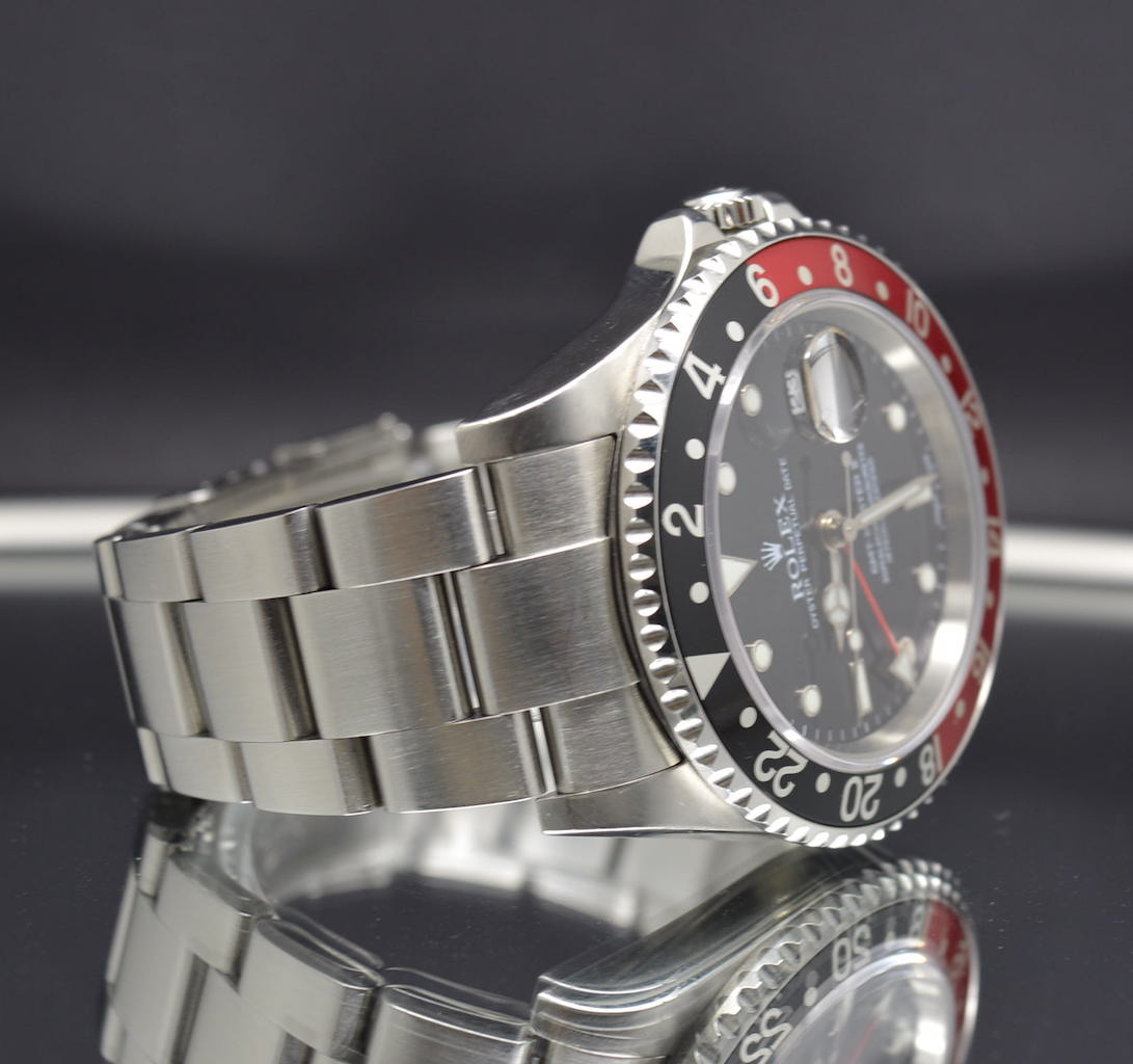 Rolex GMT Master II Coke – F Serial no Holes Case