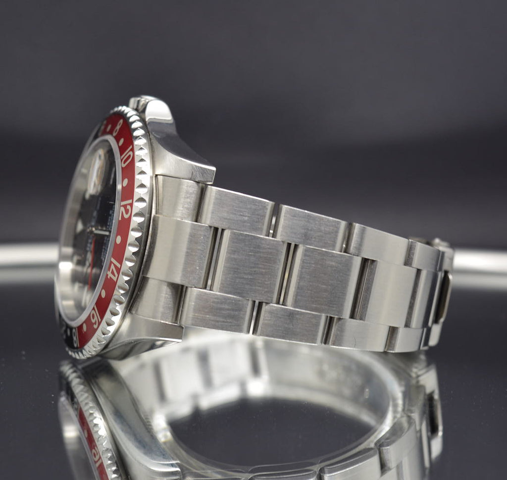 Rolex GMT Master II Coke – F Serial no Holes Case