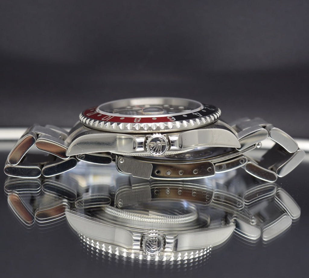 Rolex GMT Master II Coke – F Serial no Holes Case