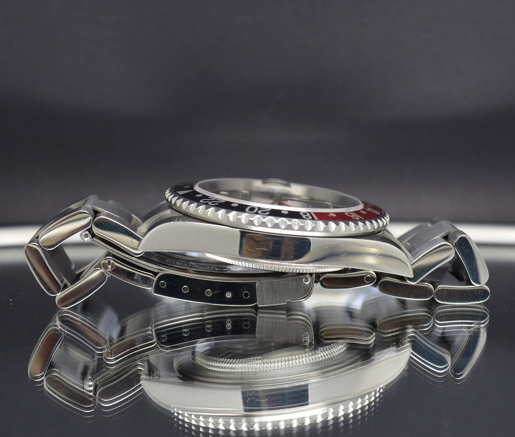 Rolex GMT Master II Coke – F Serial no Holes Case