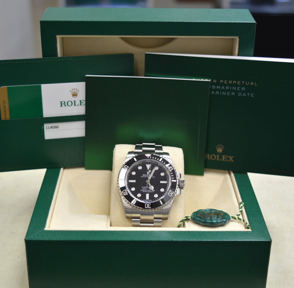 Unworn Rolex 114060 Submariner Ceramic No Date 2017 box and card
