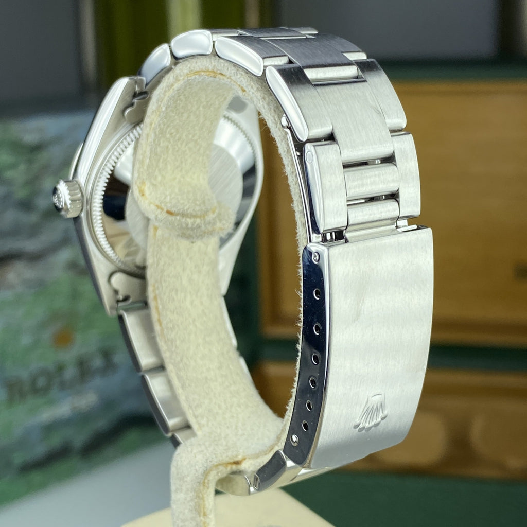 2002 Rolex Oyster Perpetual 77080 Stainless Steel 31MM Blue Dial