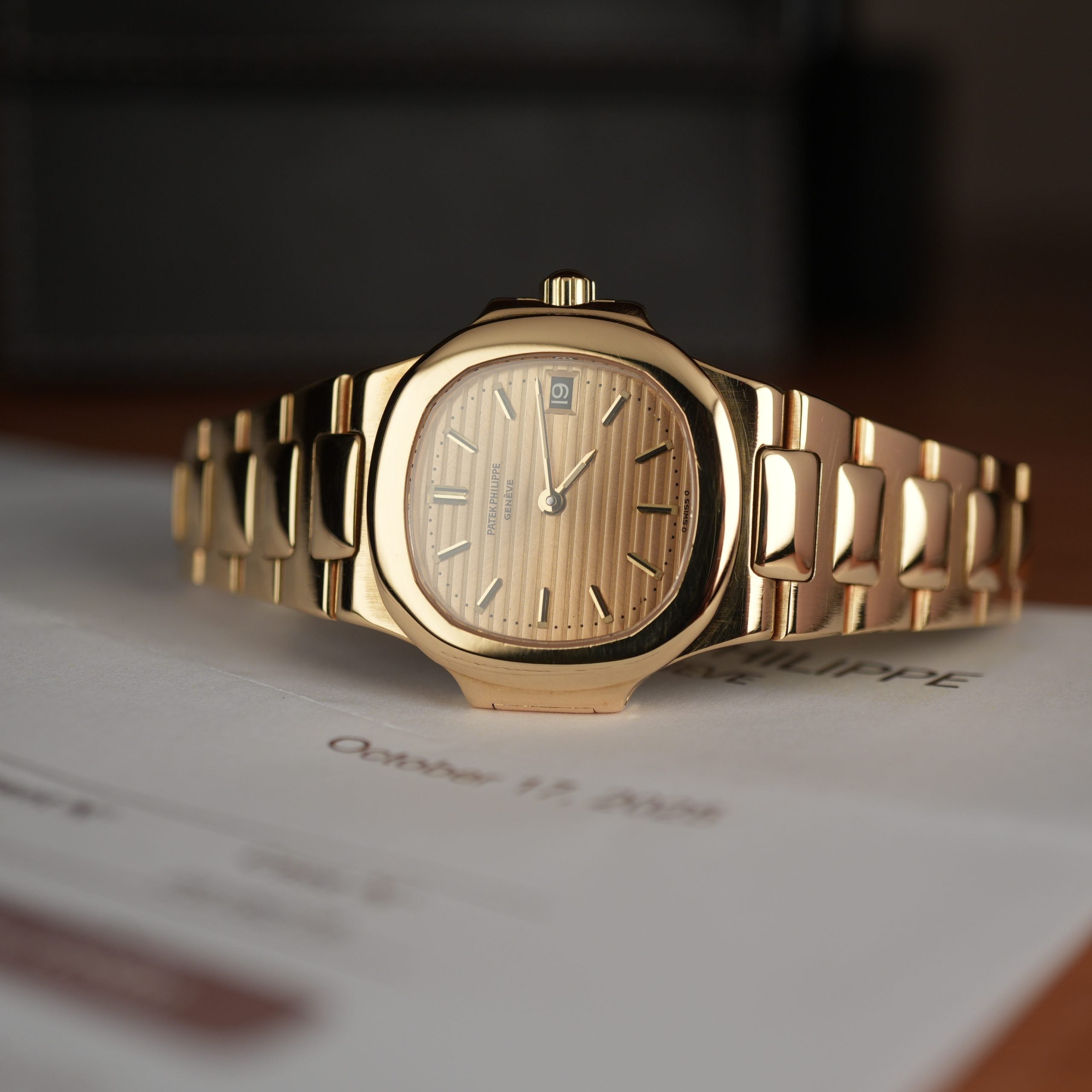 Patek Philippe Nautilus 4700 Ladies 18k Yellow Gold Champaign Dial