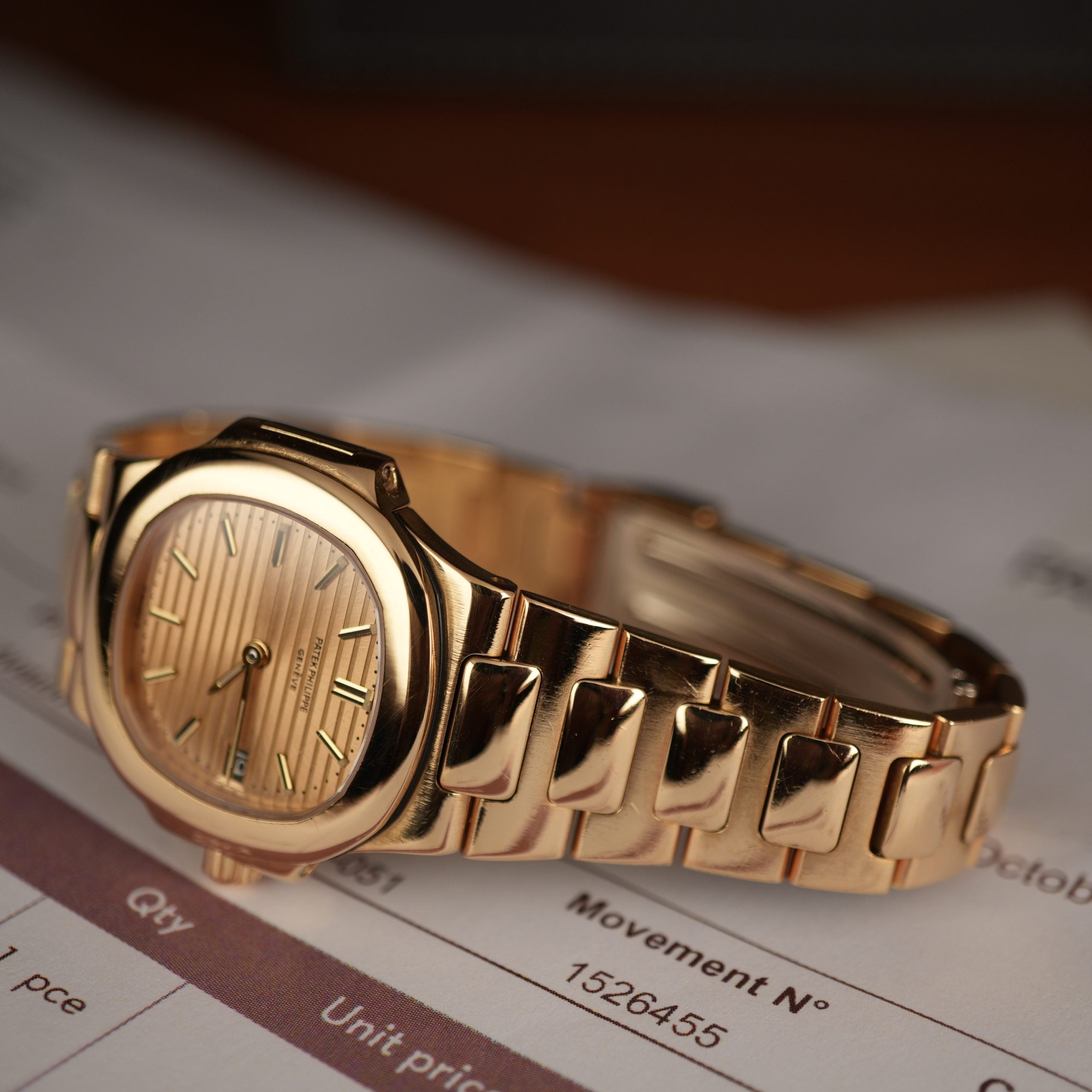 Patek Philippe Nautilus 4700 Ladies 18k Yellow Gold Champaign Dial