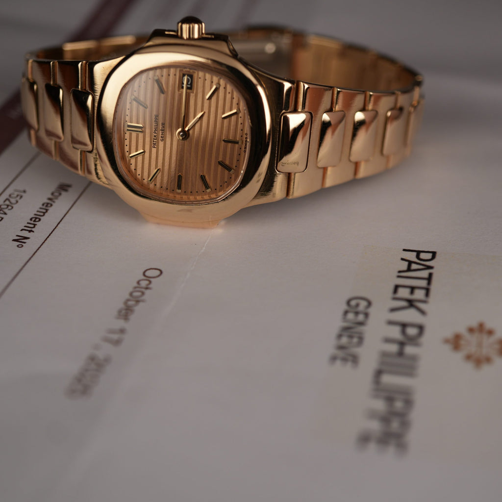 Patek Philippe Nautilus 4700 Ladies 18k Yellow Gold Champaign Dial