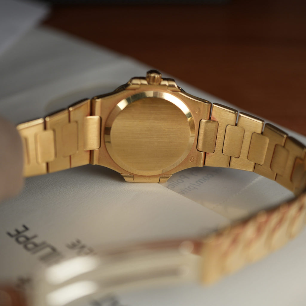 Patek Philippe Nautilus 4700 Ladies 18k Yellow Gold Champaign Dial