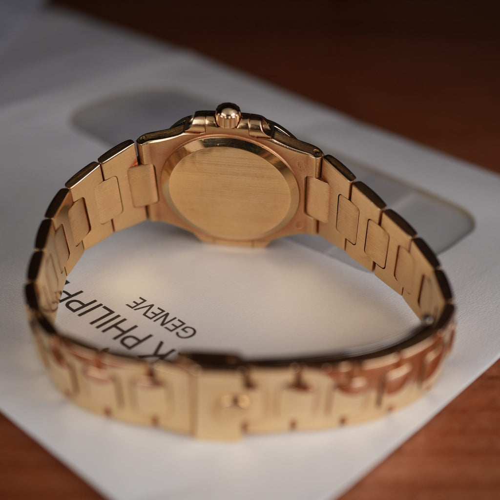 Patek Philippe Nautilus 4700 Ladies 18k Yellow Gold Champaign Dial