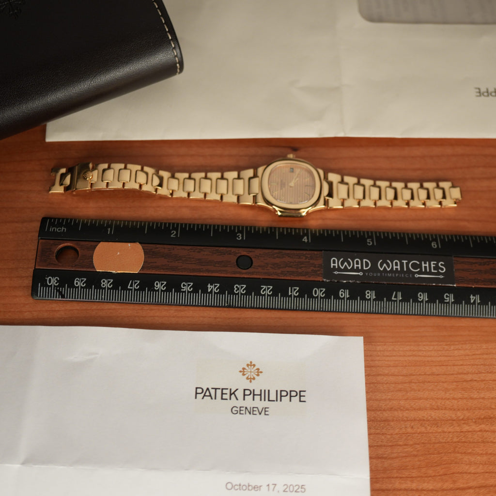 Patek Philippe Nautilus 4700 Ladies 18k Yellow Gold Champaign Dial