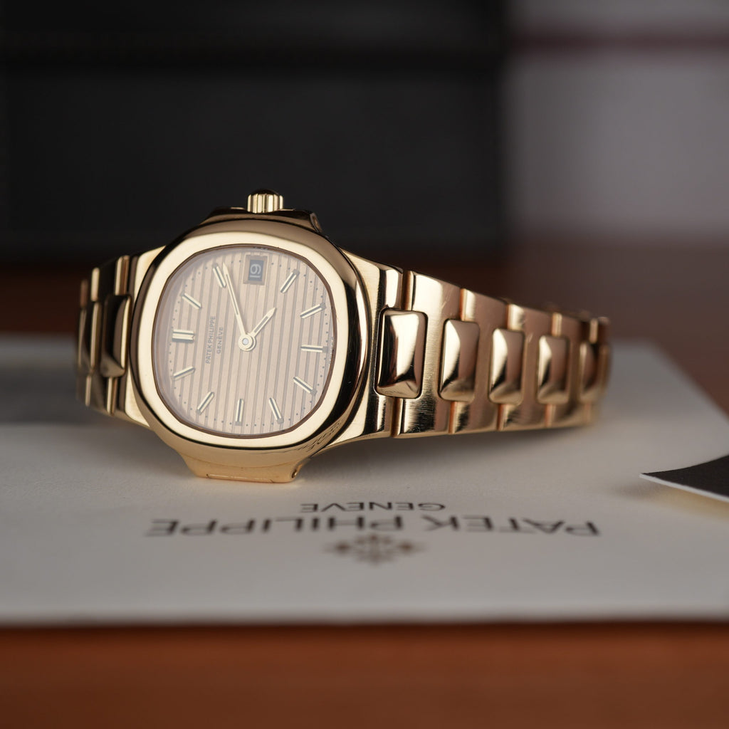 Patek Philippe Nautilus 4700 Ladies 18k Yellow Gold Champaign Dial