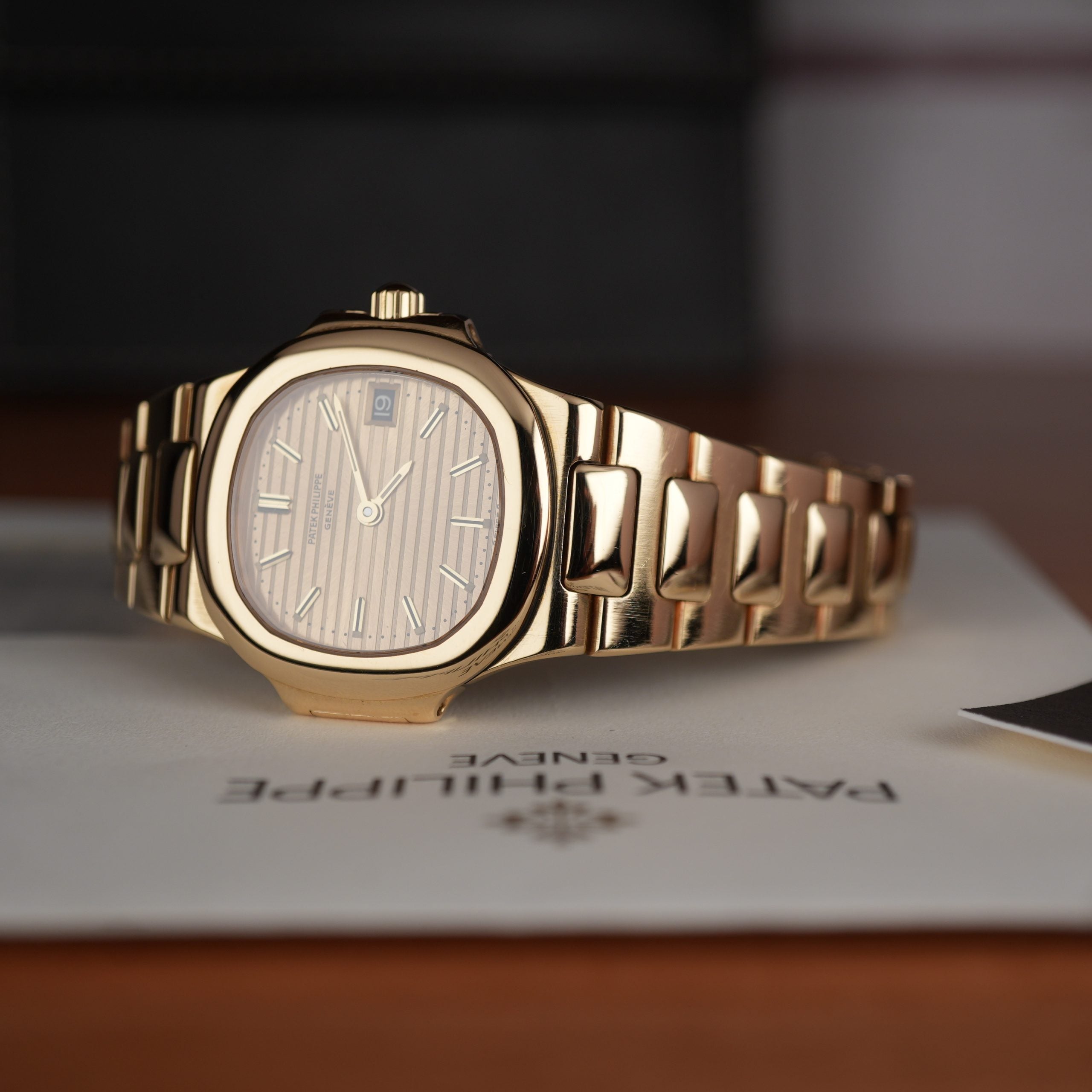 Patek Philippe Nautilus 4700 Ladies 18k Yellow Gold Champaign Dial