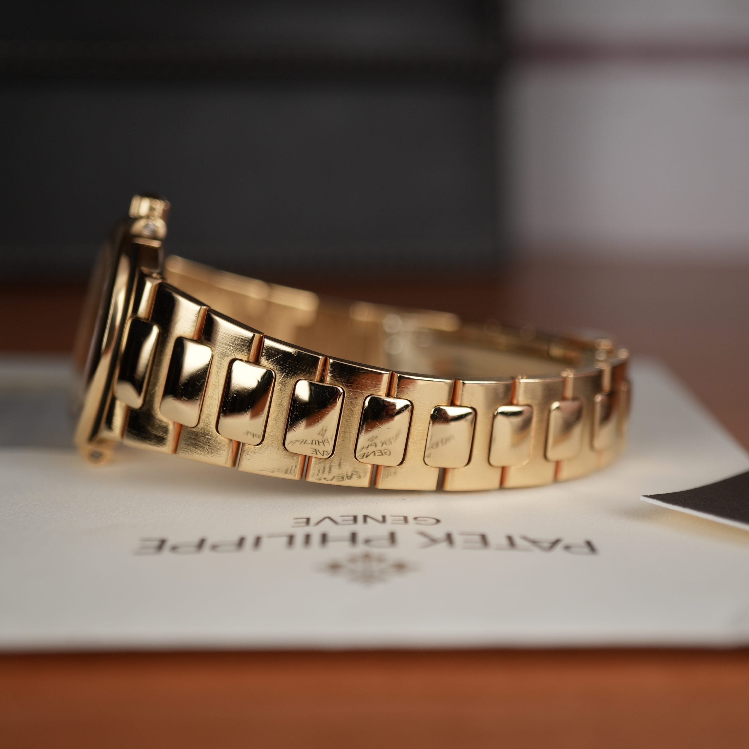 Patek Philippe Nautilus 4700 Ladies 18k Yellow Gold Champaign Dial