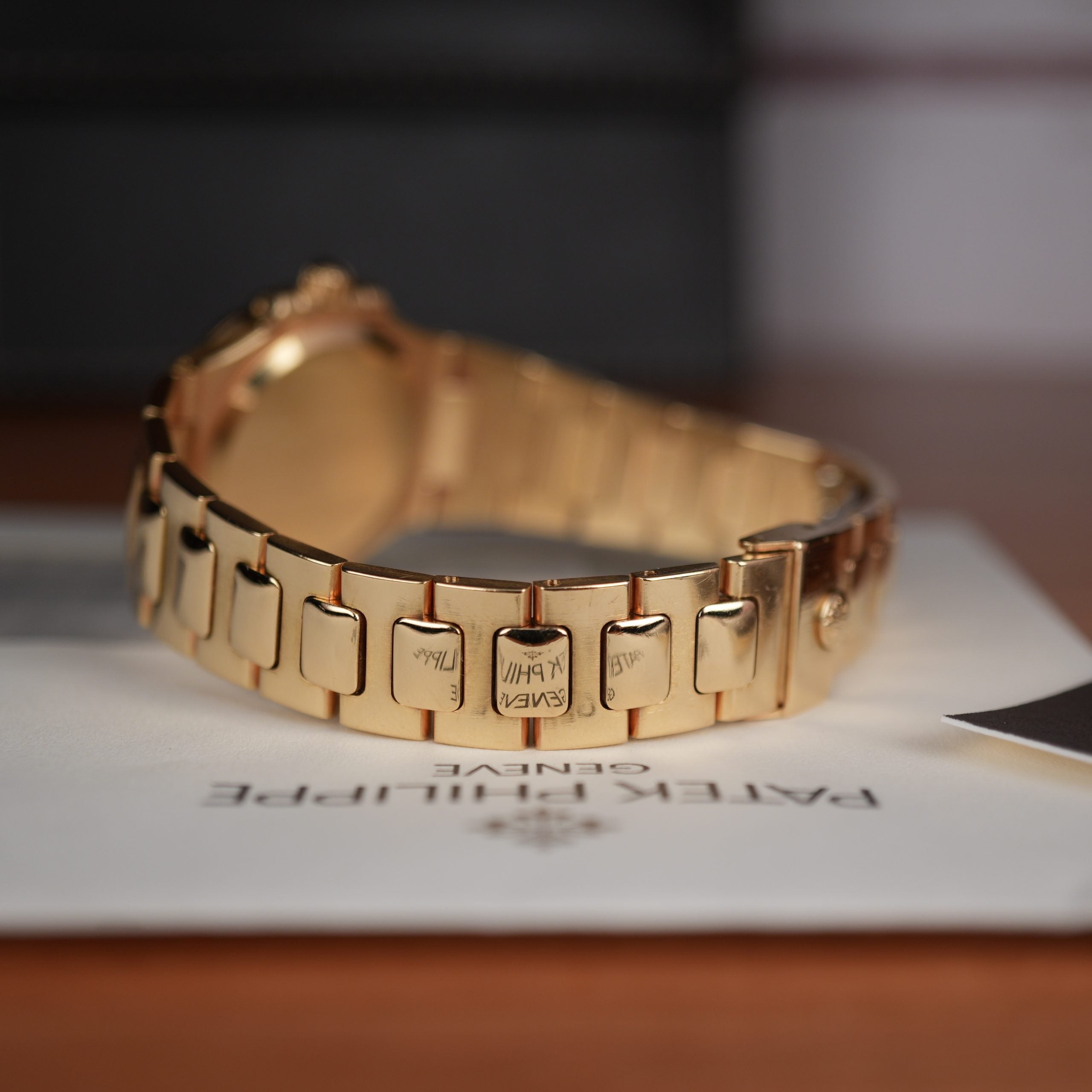 Patek Philippe Nautilus 4700 Ladies 18k Yellow Gold Champaign Dial