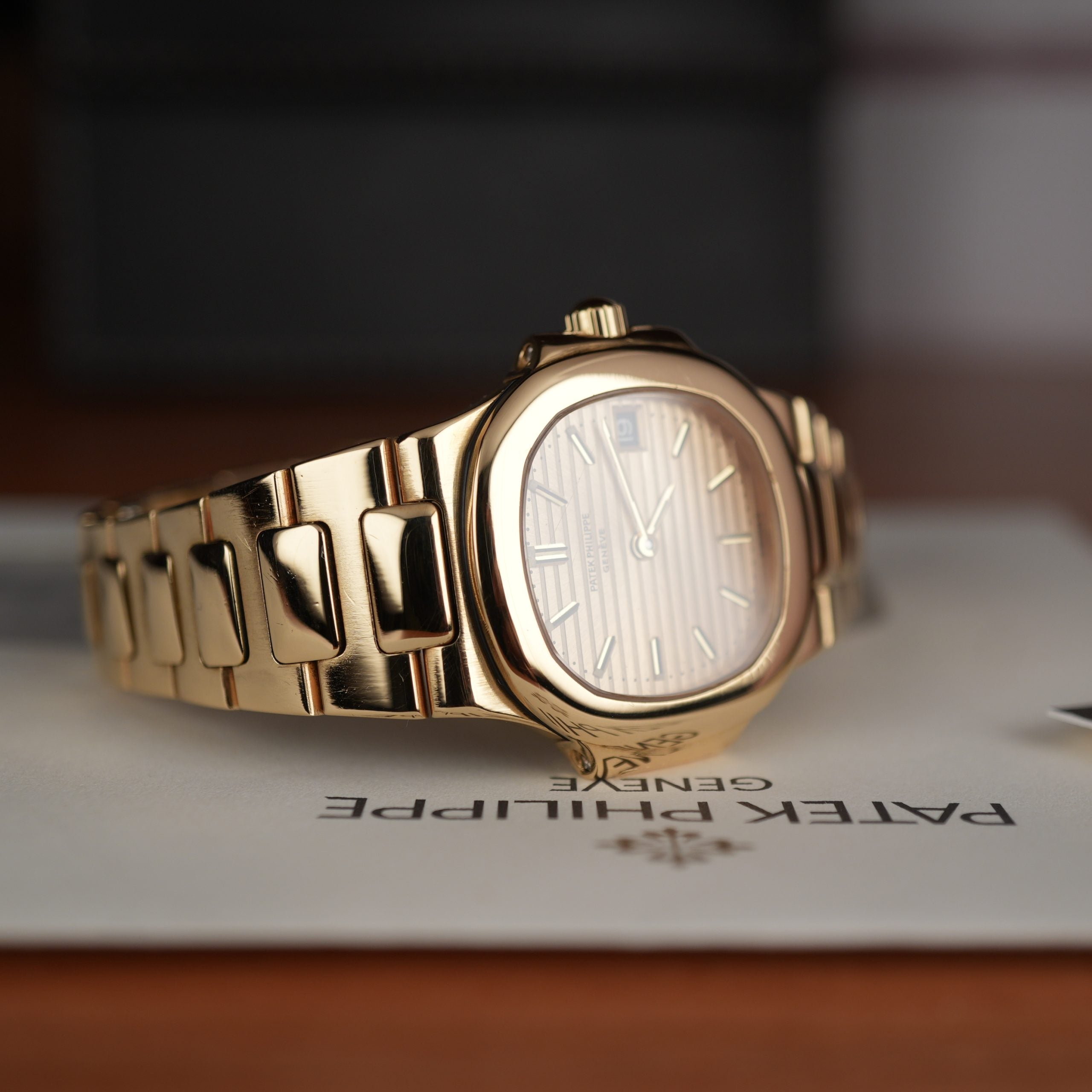 Patek Philippe Nautilus 4700 Ladies 18k Yellow Gold Champaign Dial
