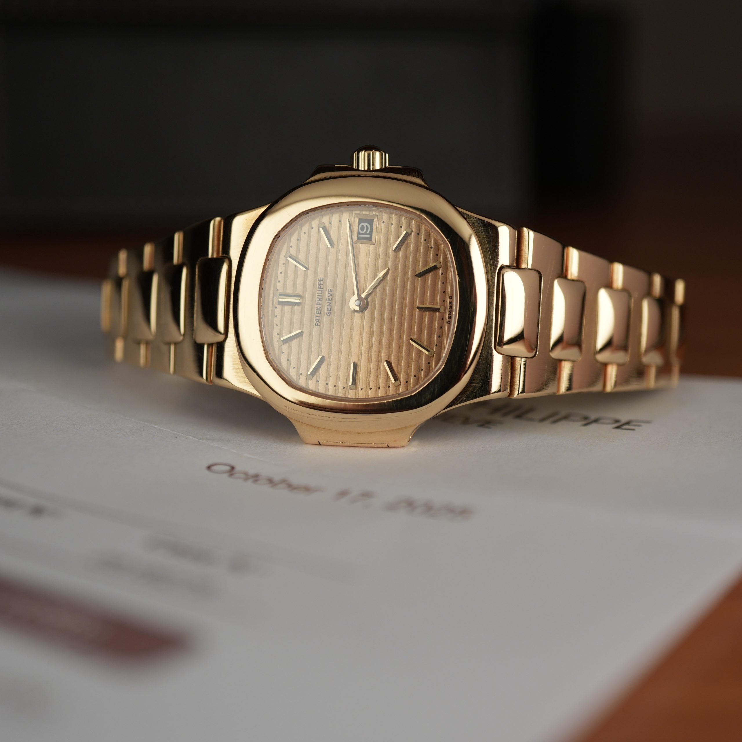 Patek Philippe Nautilus 4700 Ladies 18k Yellow Gold Champaign Dial