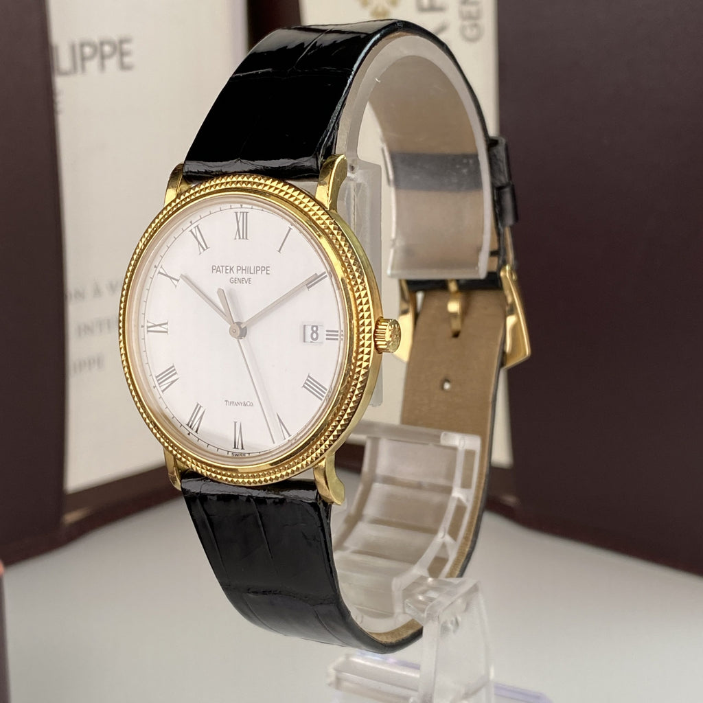 Patek Philippe Ref 3944 J Calatrava Retailed by Tiffany & Co.18k Yellow Gold Complete Set Box and Papers
