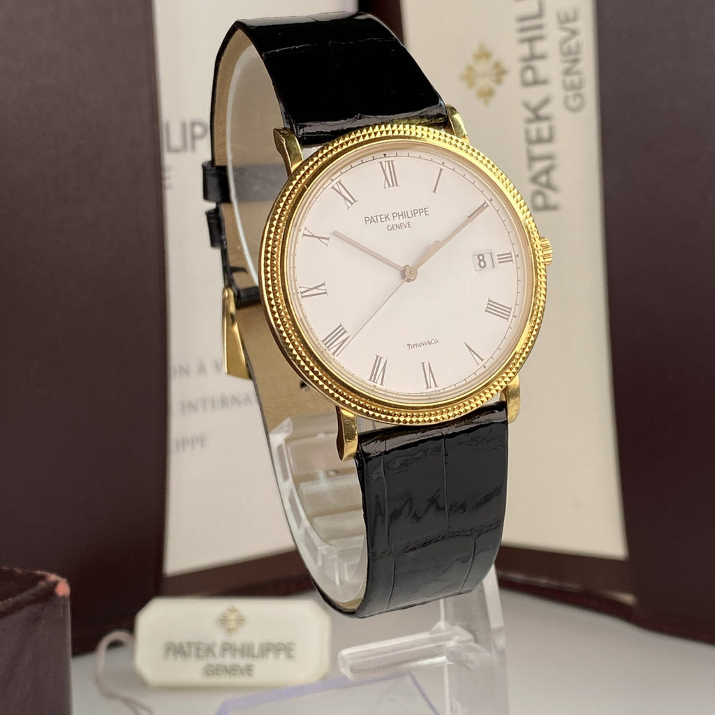 Patek Philippe Ref 3944 J Calatrava Retailed by Tiffany & Co.18k Yellow Gold Complete Set Box and Papers