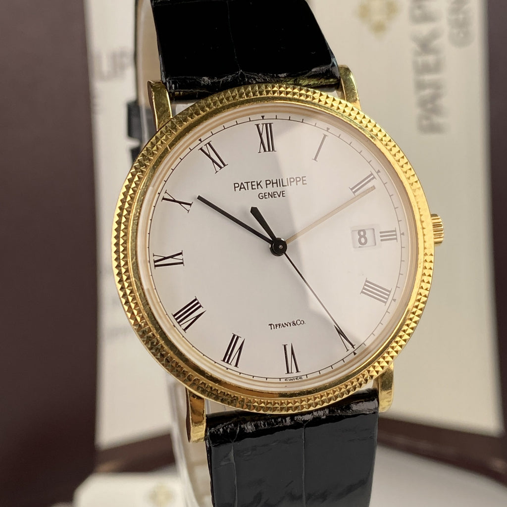 Patek Philippe Ref 3944 J Calatrava Retailed by Tiffany & Co.18k Yellow Gold Complete Set Box and Papers