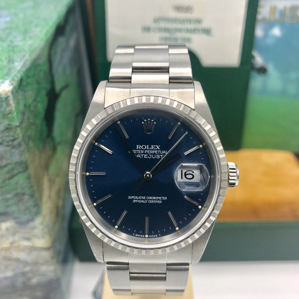 NOS Rolex Date Just 16220 blue dial with box and papers