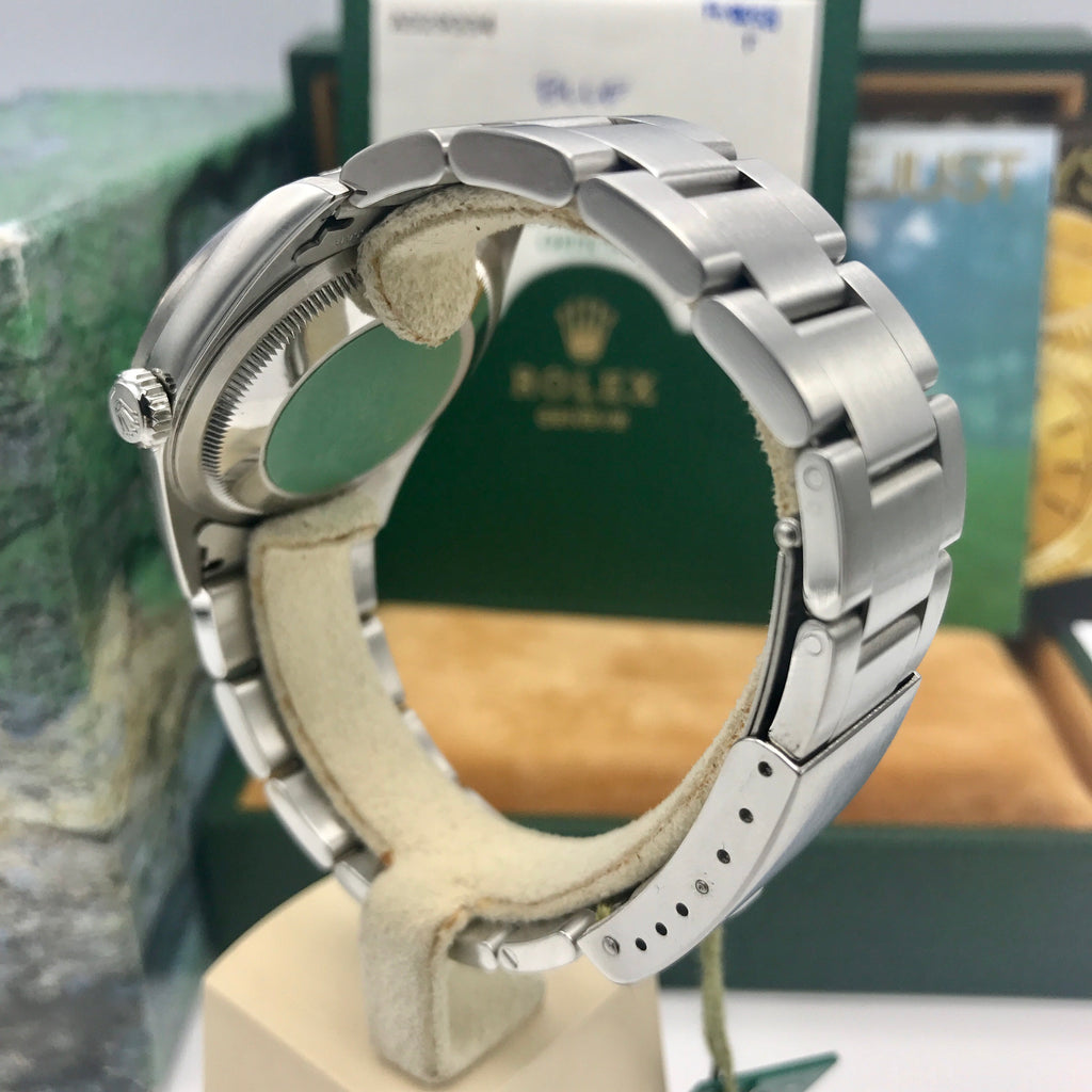 NOS Rolex Date Just 16220 blue dial with box and papers