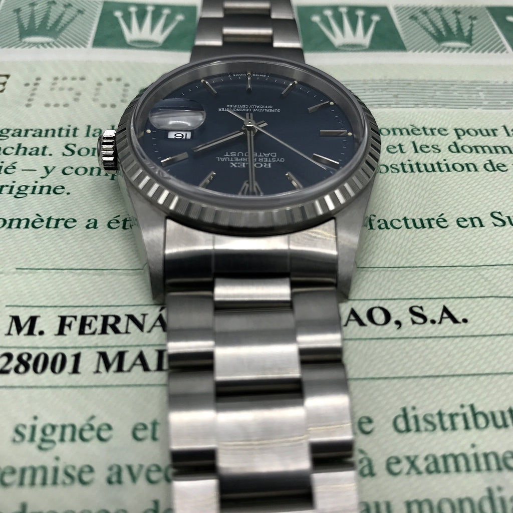 NOS Rolex Date Just 16220 blue dial with box and papers