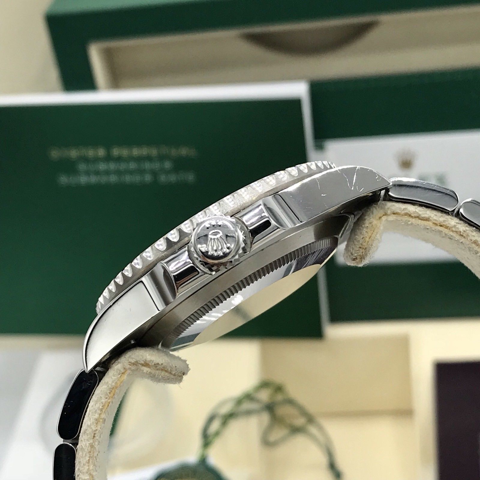 2017 Rolex Submariner 114060 No date Ceramic pre-owned box papers