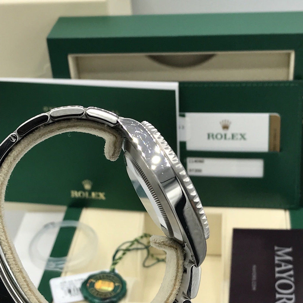 2017 Rolex Submariner 114060 No date Ceramic pre-owned box papers