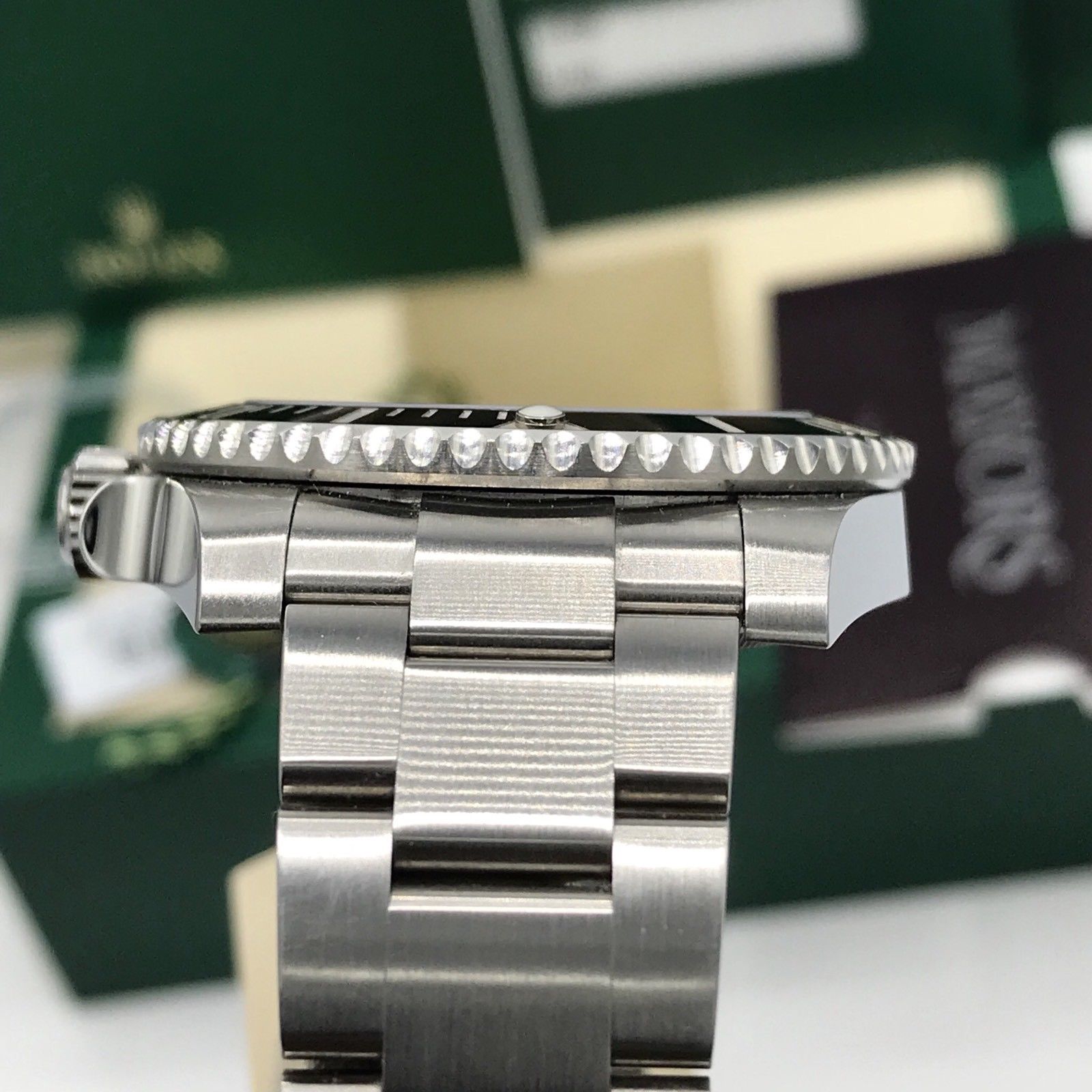 2017 Rolex Submariner 114060 No date Ceramic pre-owned box papers