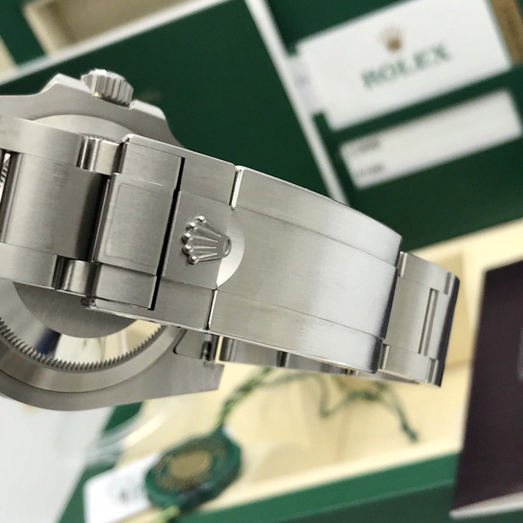 2017 Rolex Submariner 114060 No date Ceramic pre-owned box papers