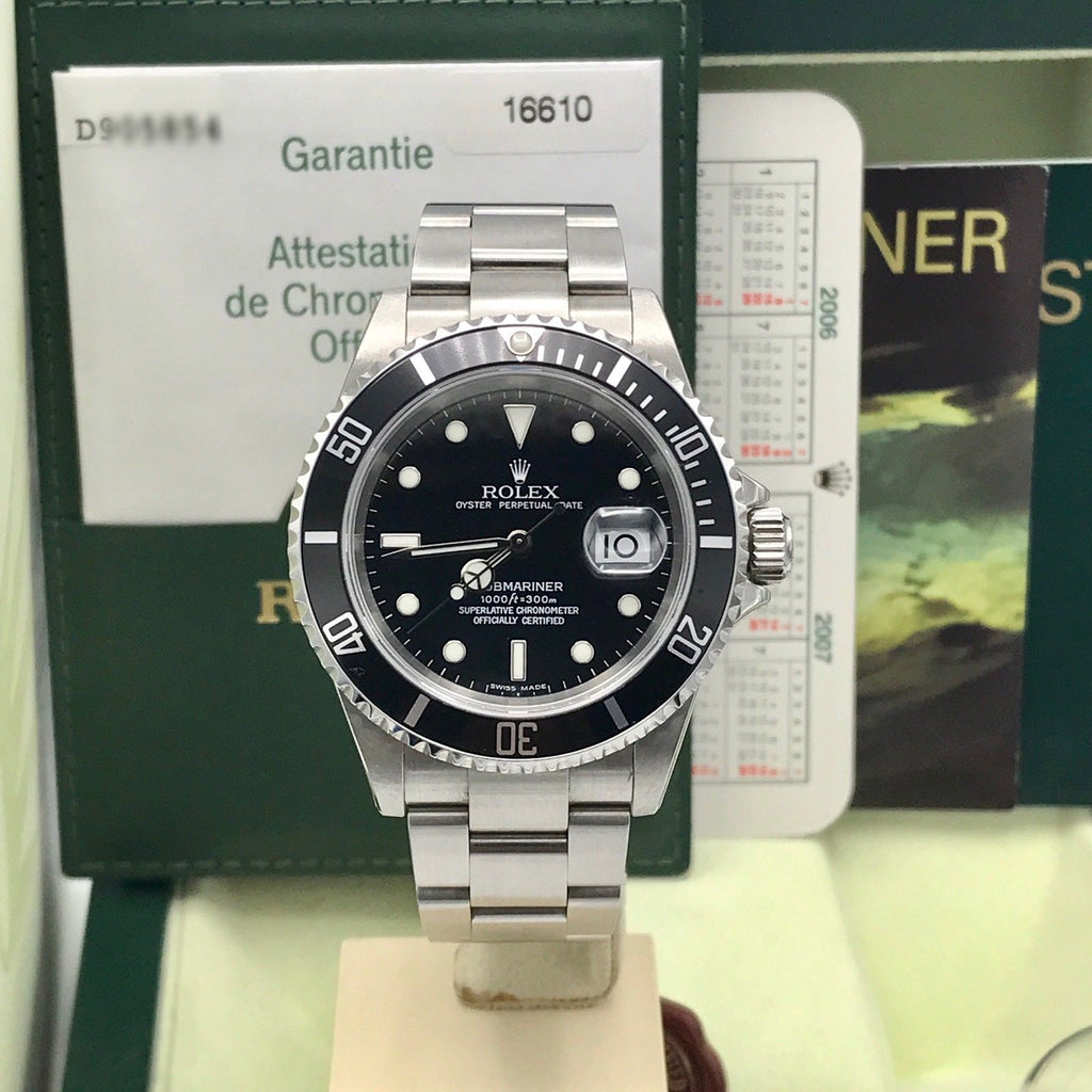 Unworn Rolex Submariner 16610 FULL SET Papers D Serial 2006 NOS