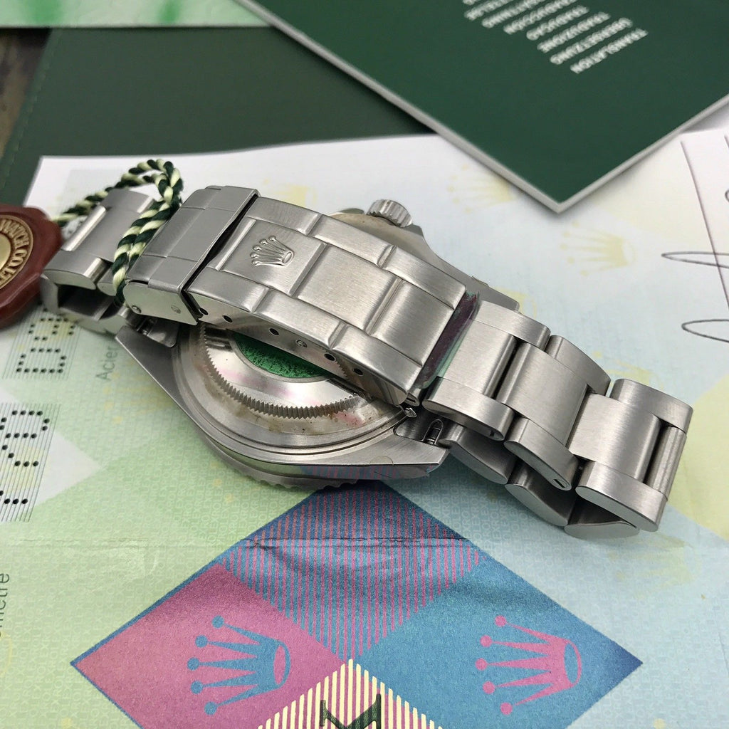 Unworn Rolex Submariner 16610 FULL SET Papers D Serial 2006 NOS