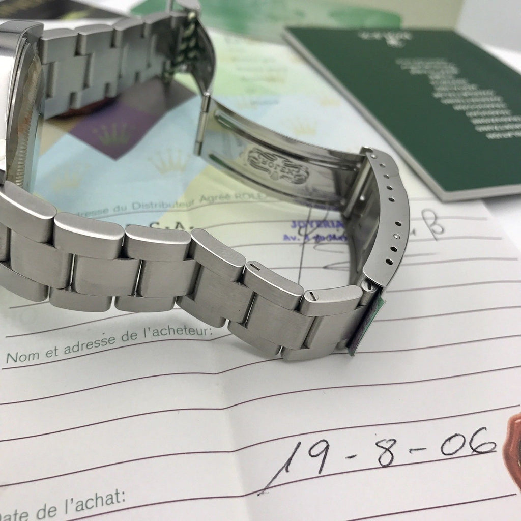 Unworn Rolex Submariner 16610 FULL SET Papers D Serial 2006 NOS