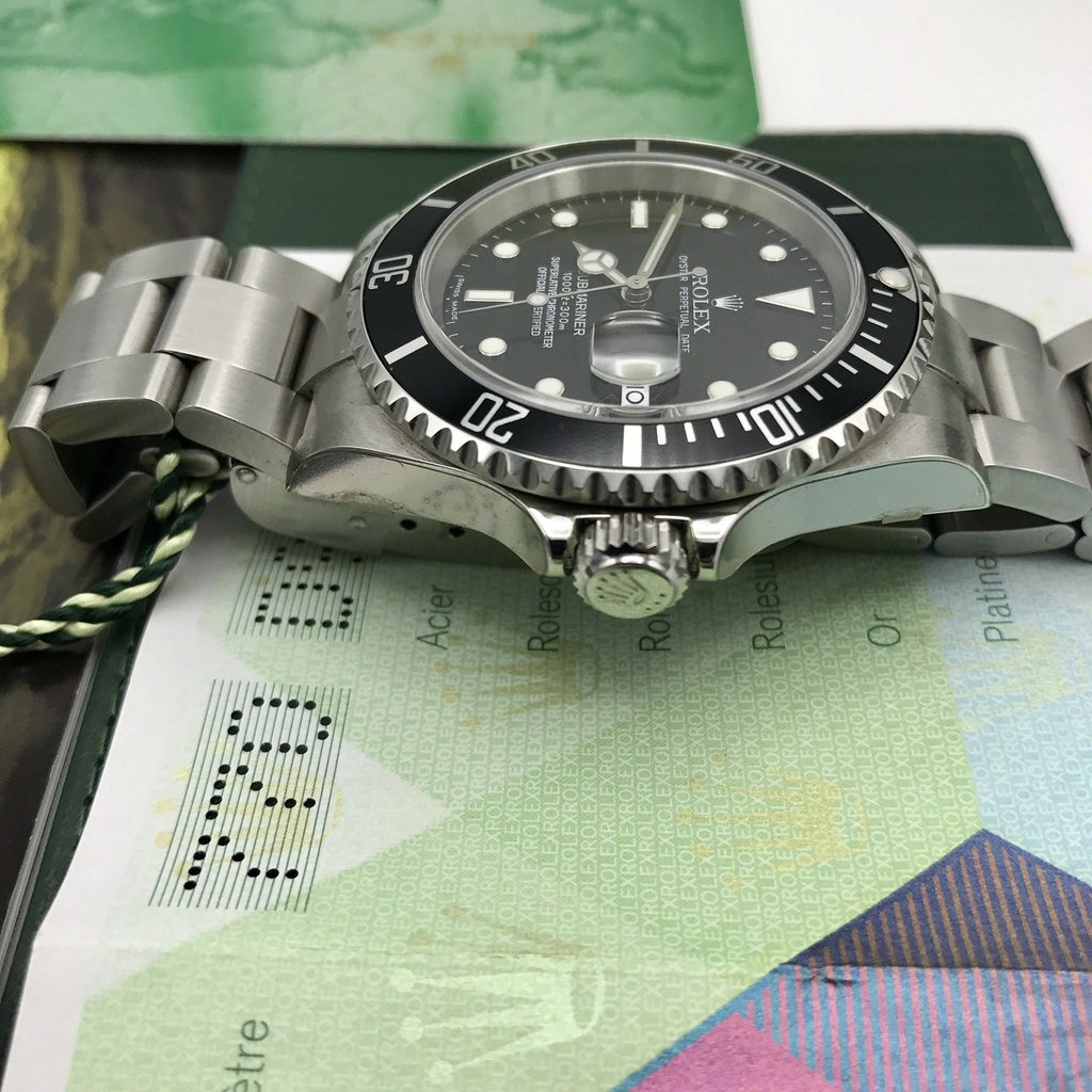 Unworn Rolex Submariner 16610 FULL SET Papers D Serial 2006 NOS